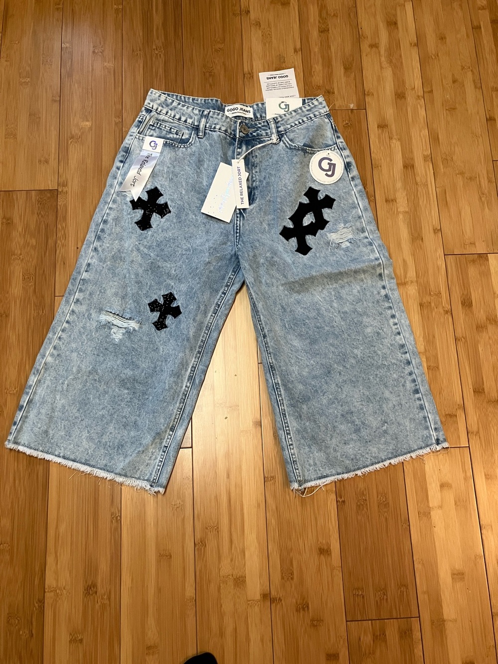 GOGO Light Blue Wide-Leg Cropped Jeans with Black Cross Patches